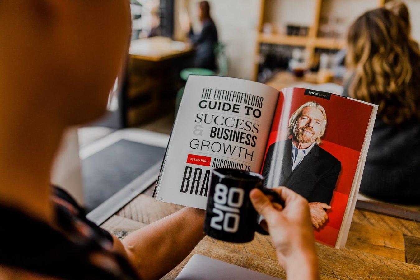 Entrepreneur reading a book