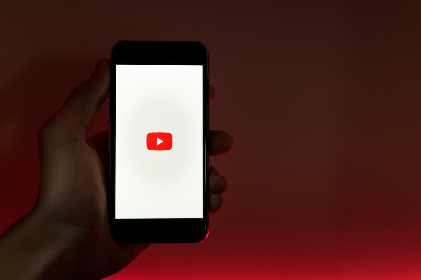 Holding phone with YouTube app