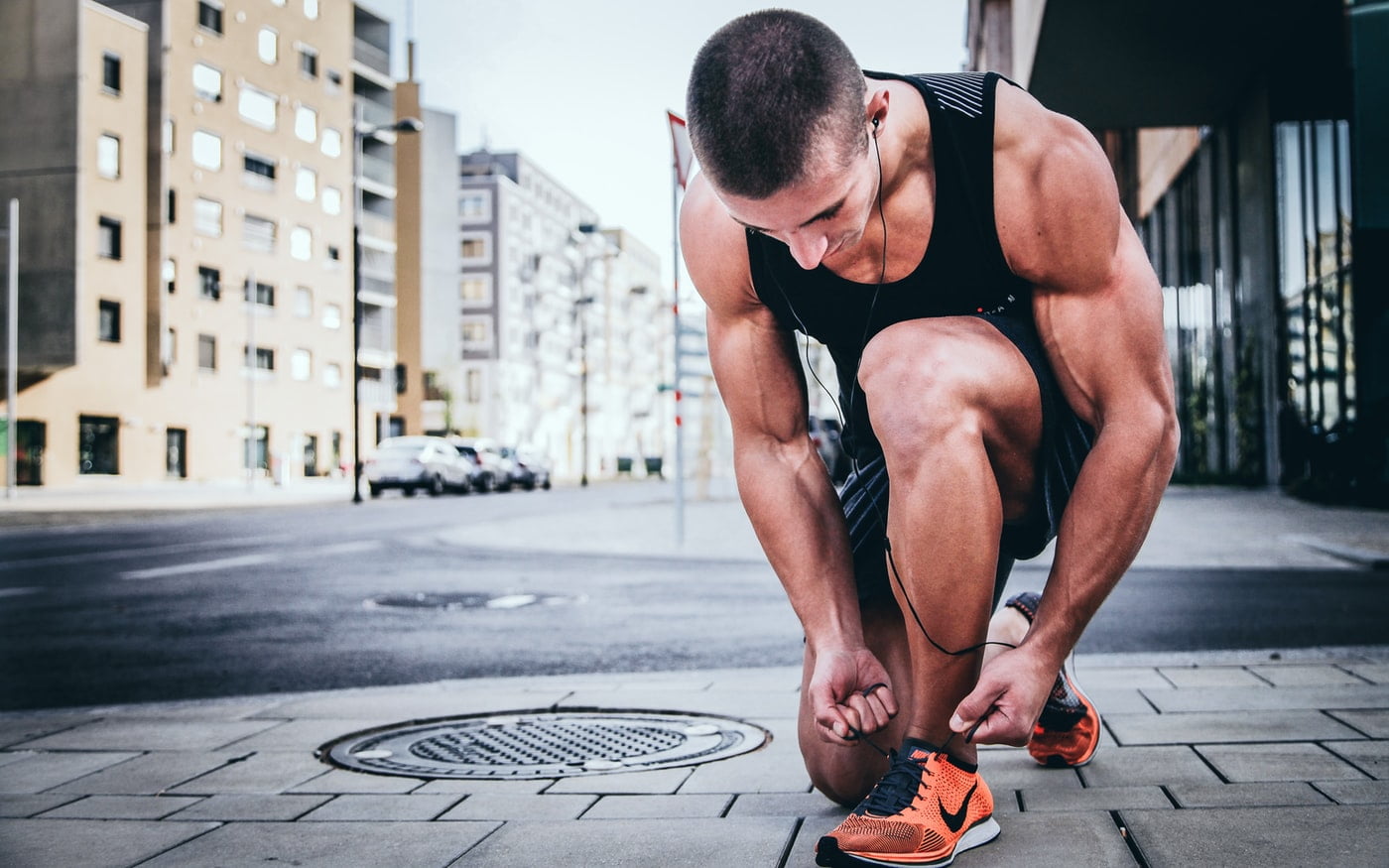 Man tying shoe