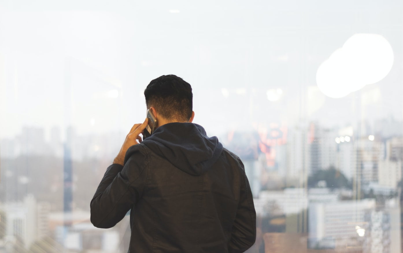 Man on phone facing away