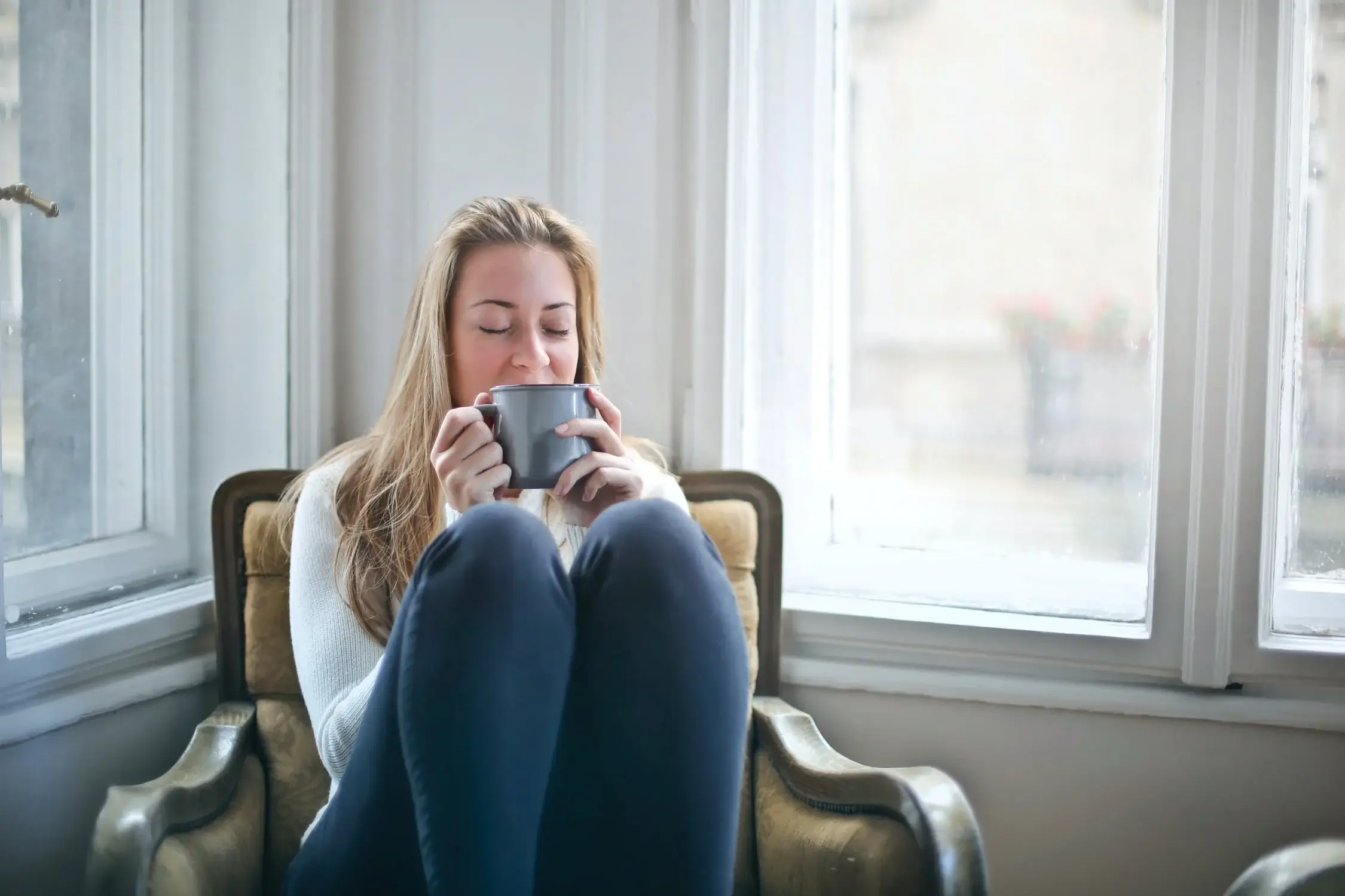 Woman relaxing drinking tea