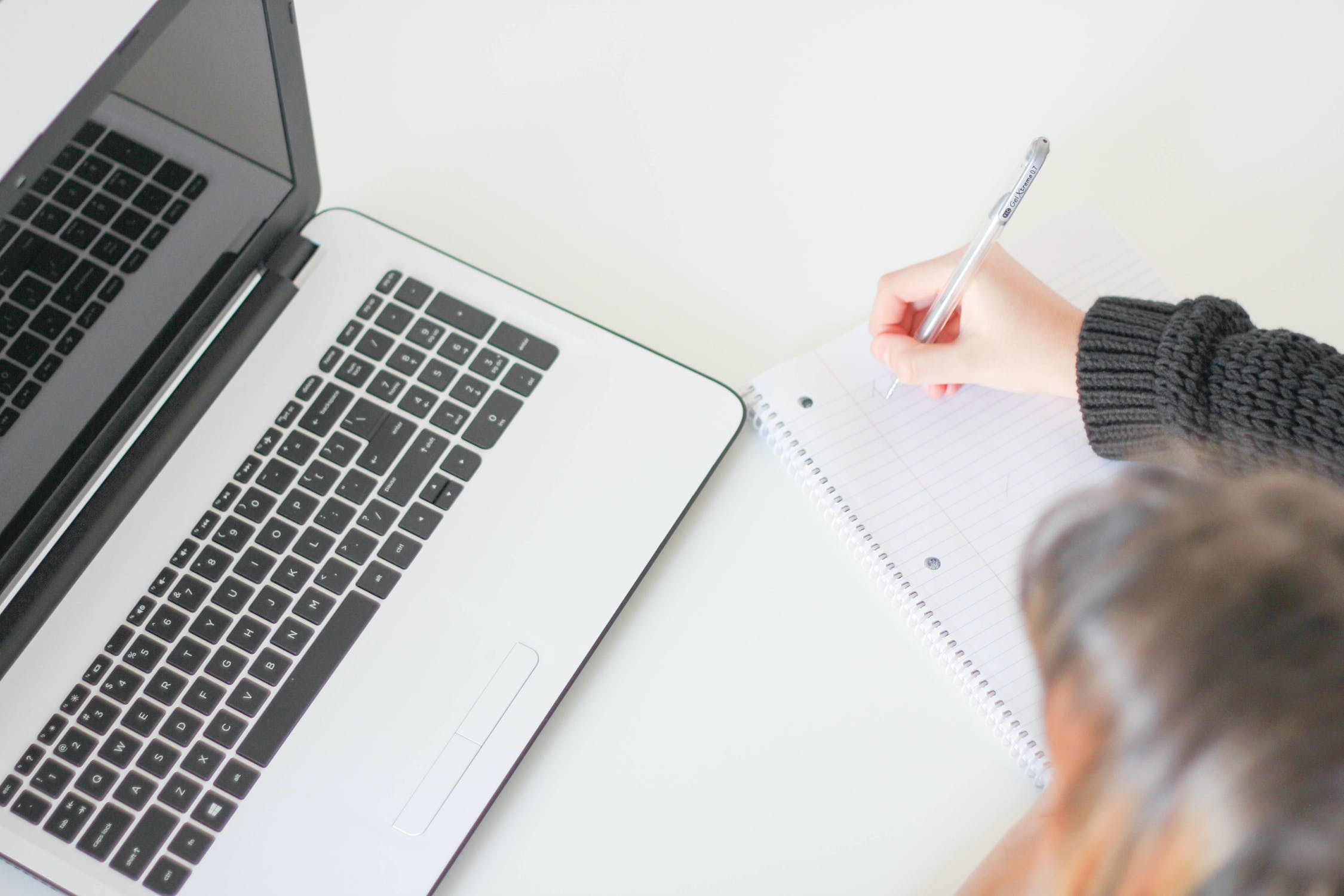 Woman copywriting in front of laptop