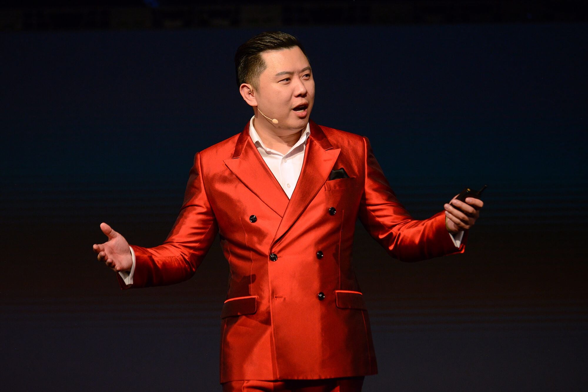 Dan Lok red suit