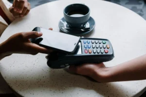 Person paying with phone