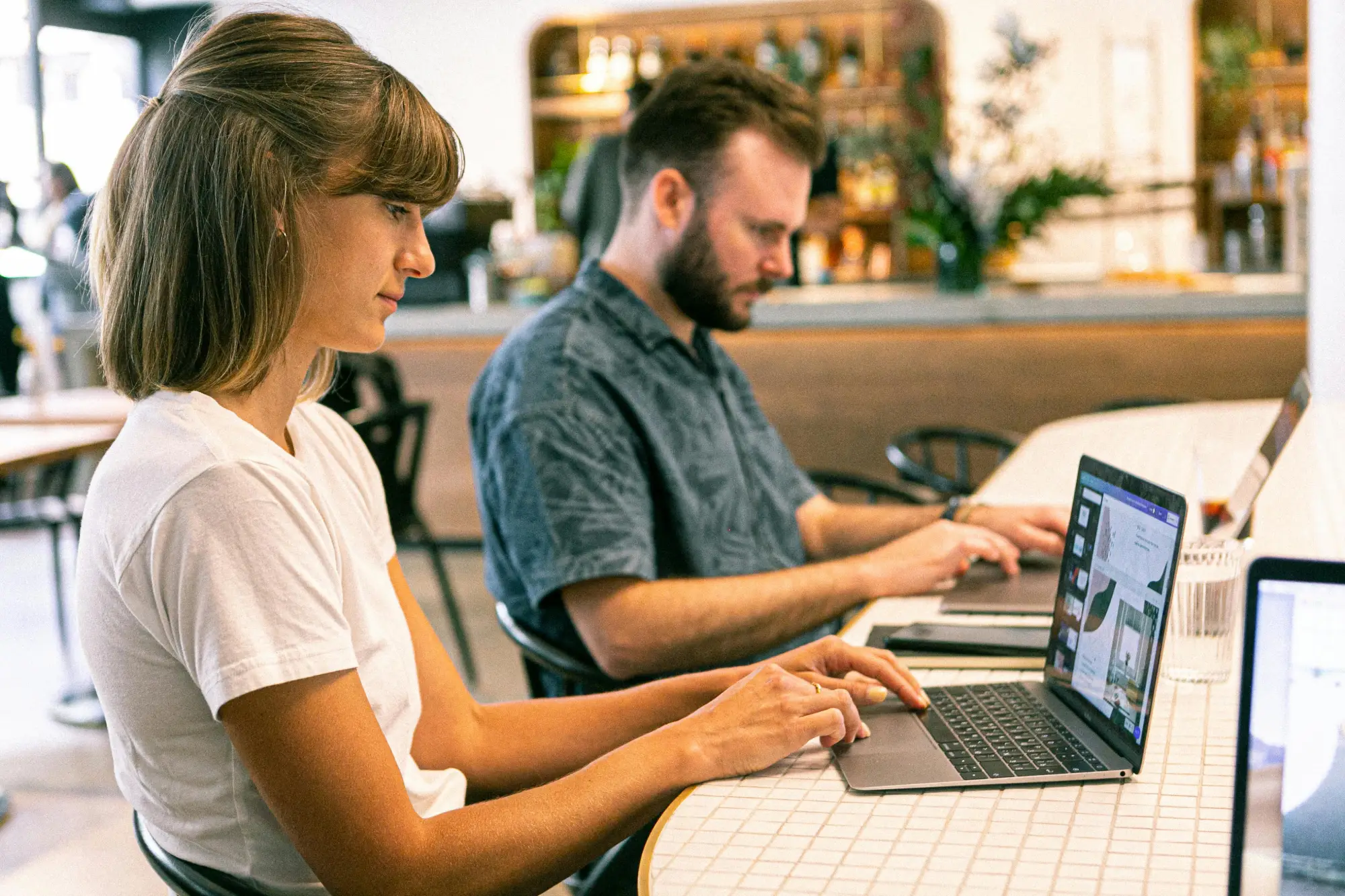 marketers working on laptops
